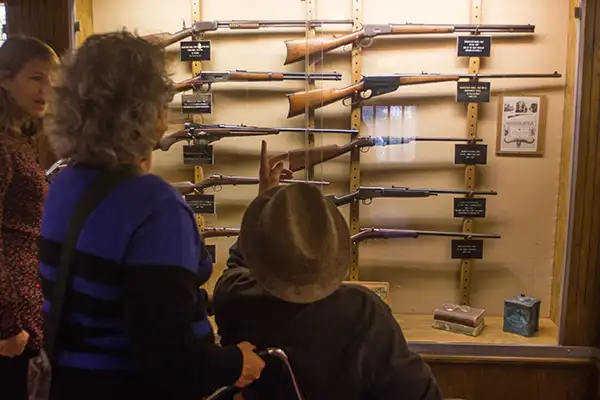 Peter explains the Winchester guns on display