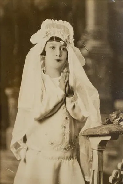 Vintage photo of a young girl at holy communion