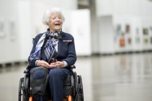 Wish recipient and WWII Veteran Doris smiles broadly after commemorating service in Washington DC