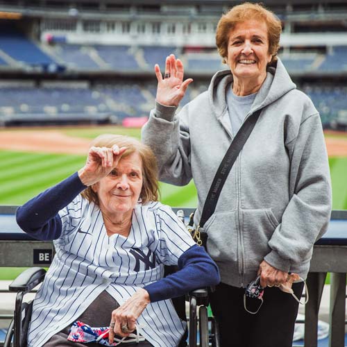 Sisters and lifelong Yankees fans reunite at a baseball game