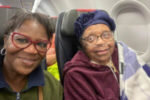 Hattie and her niece on airplane trip to return to Mississippi