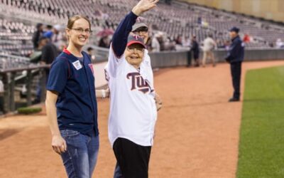 Louise Throws The First Pitch