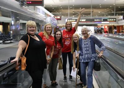Julie meets Wish of a Lifetime staff and DaVita volunteers in her Denver layover