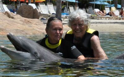 Beverly Swims With Dolphins at Discovery Cove