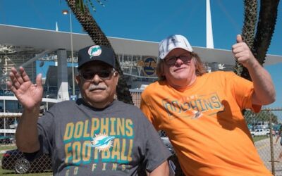 Simon watches the Miami Dolphins defeat the Buffalo Bills