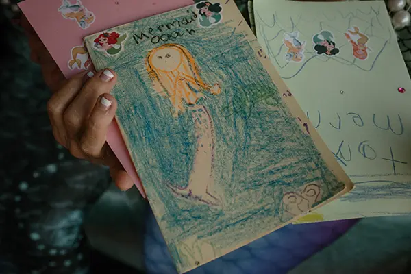 Mermaid-themed artwork drawn by children.