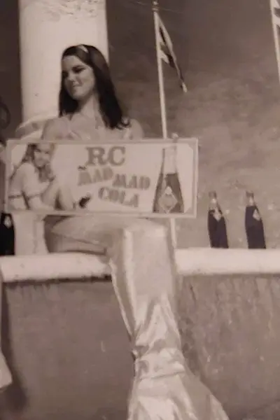 A woman in the 1960s wears a mermaid costume.