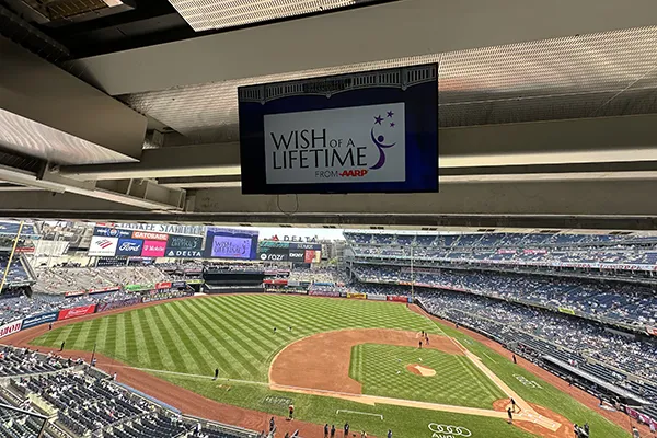 Wish of a Lifetime appears on a screen in Yankee Stadium.