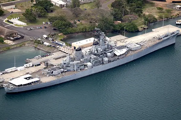 An arial view of a World War II ship in Pearl Harbor