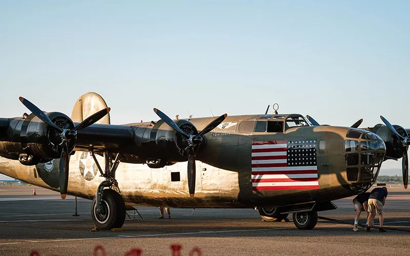 A B-24 airplane with an American flag painted on the side