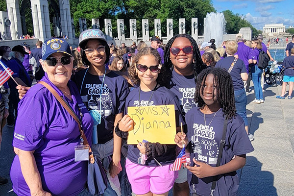 Voyage-ValorWoman-Veteran-with-School-Kids-Wish-Lifetime Wish of a Lifetime champions for change senior wishes