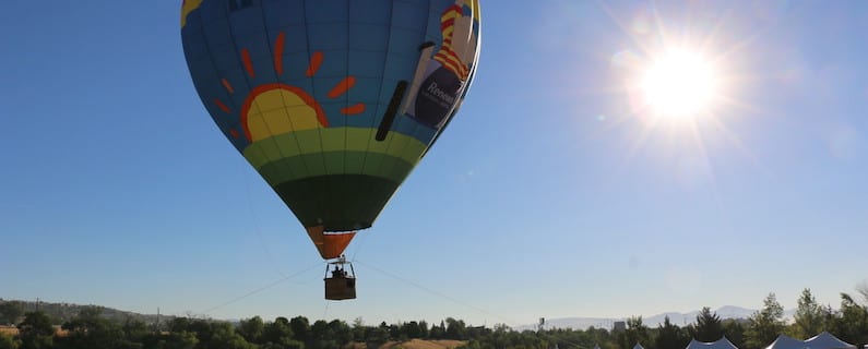 Bev flies in a hot air balloon at the Great Reno Balloon Races